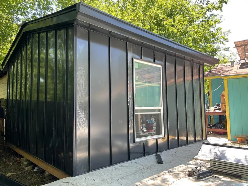 Black standing seam metal wall panels for Metal Roof Installation in Cordele